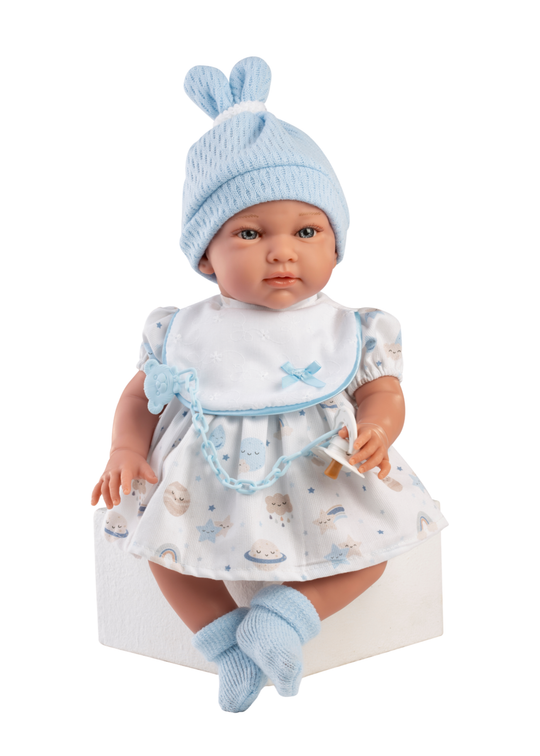 Papusa Adriana, 42 cm, Fara Par, Corp Vinil+Textil cu Rochita Alba Imprimeu Planete si Caciula Bleu 887 Guca Munecas