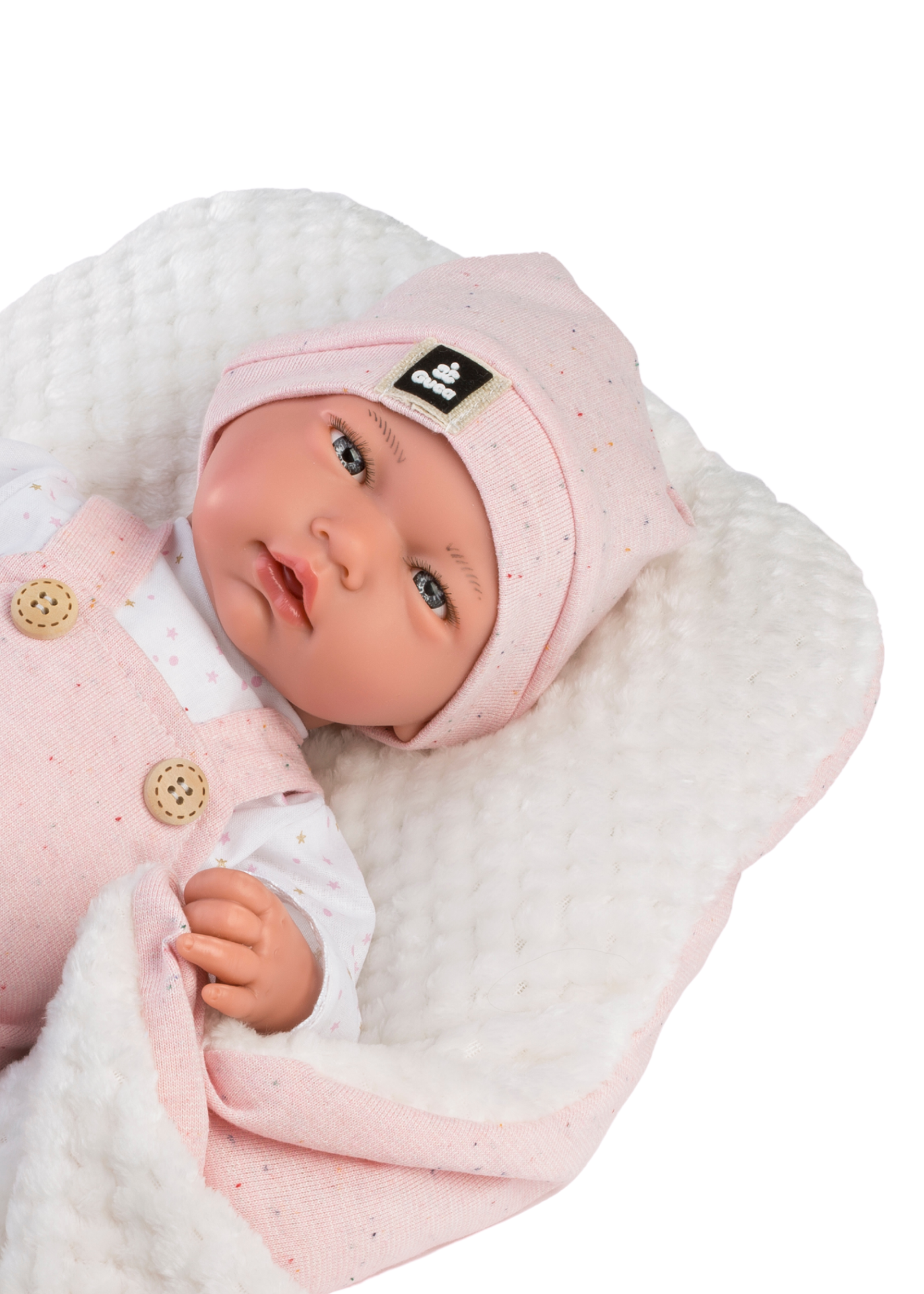 Papusa Indira, 38 cm, Fara Par, Corp Vinil+Textil, Mecanism cu Salopeta Tricotata Roz si Paturica Alb-Roz cu Blanita 962 Guca Munecas